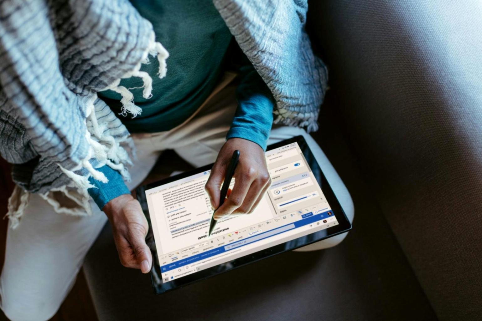 Professional analyzing market data on multiple screens